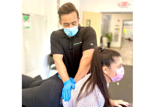 Herniated Disc being treated by physical therapist