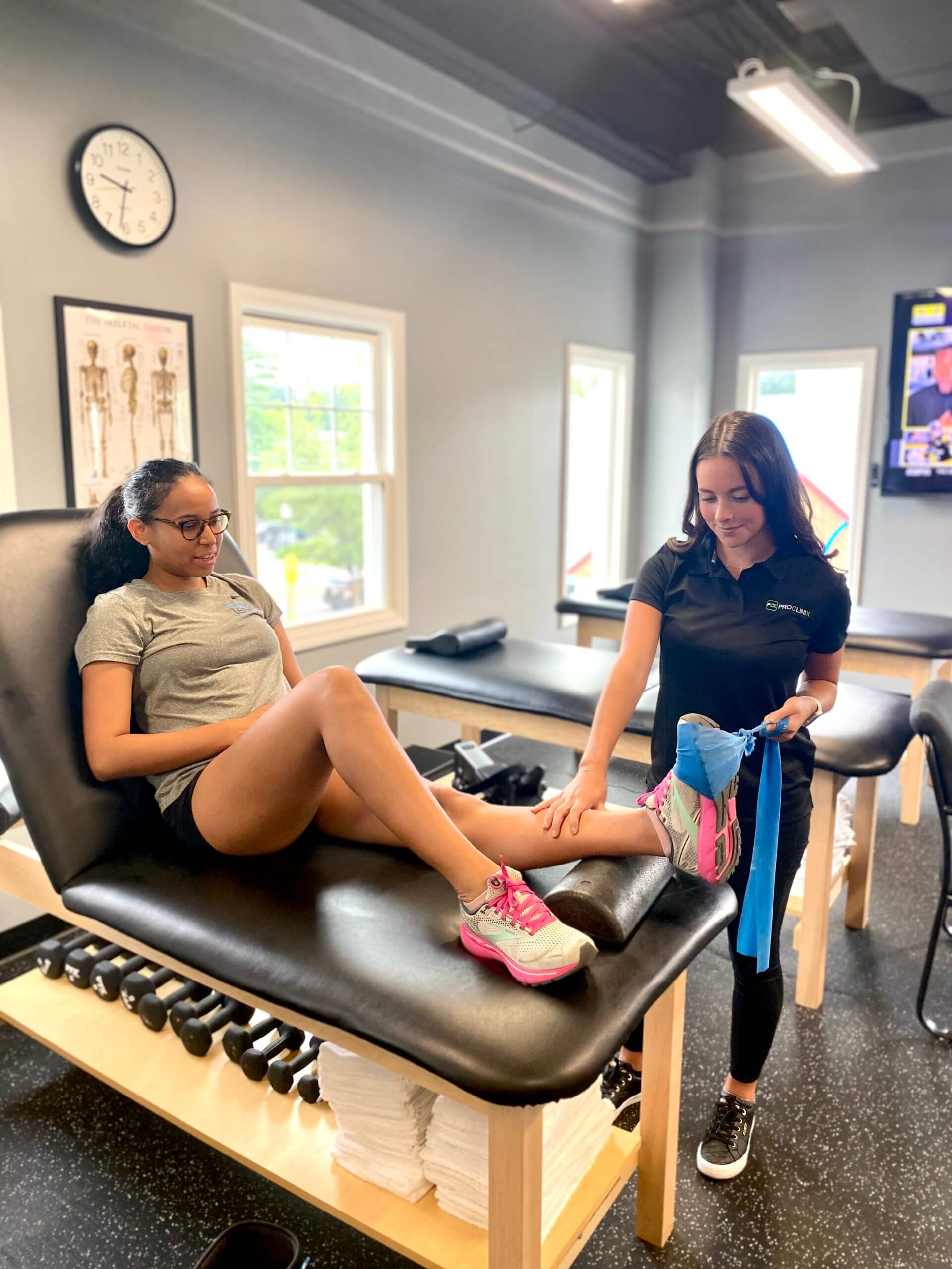 ProClinix Sports Physical Therapy & Chiropractic - Julia Olivieri, ATC working with this patient who had an achilles injury